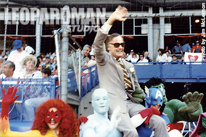 Stan Lee held up by Marvel heroes at Spidermans wedding
